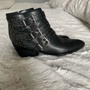Black ankle boots with silver stud details